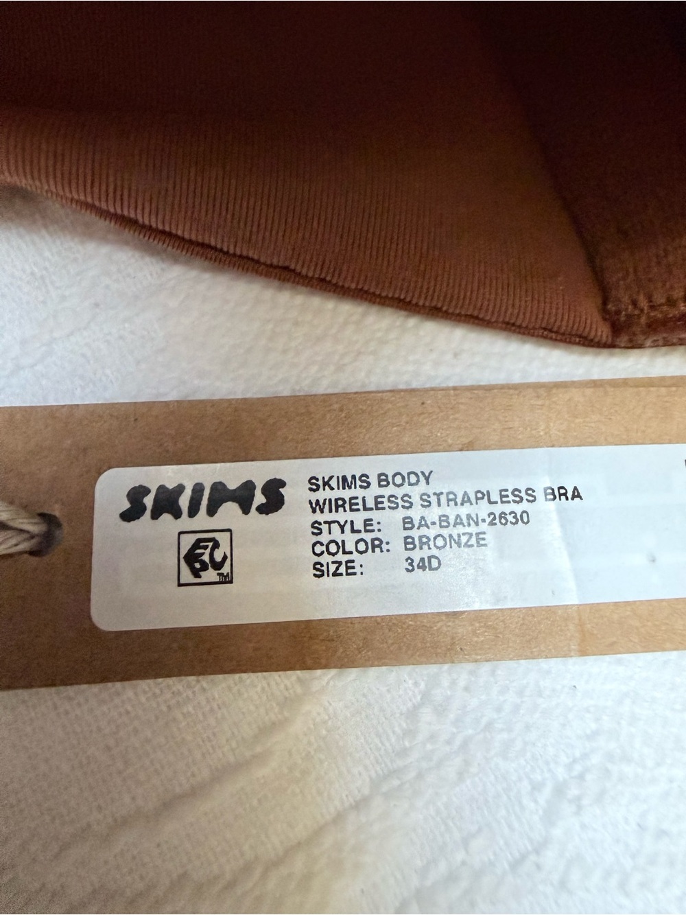 SKIMS Wireless Strapless Bra - 34D Bronze - Picture 10 of 10